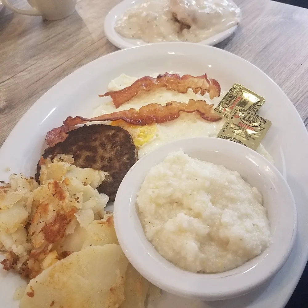 One Egg Home Fries or Grits Bacon or Sausage & Toast